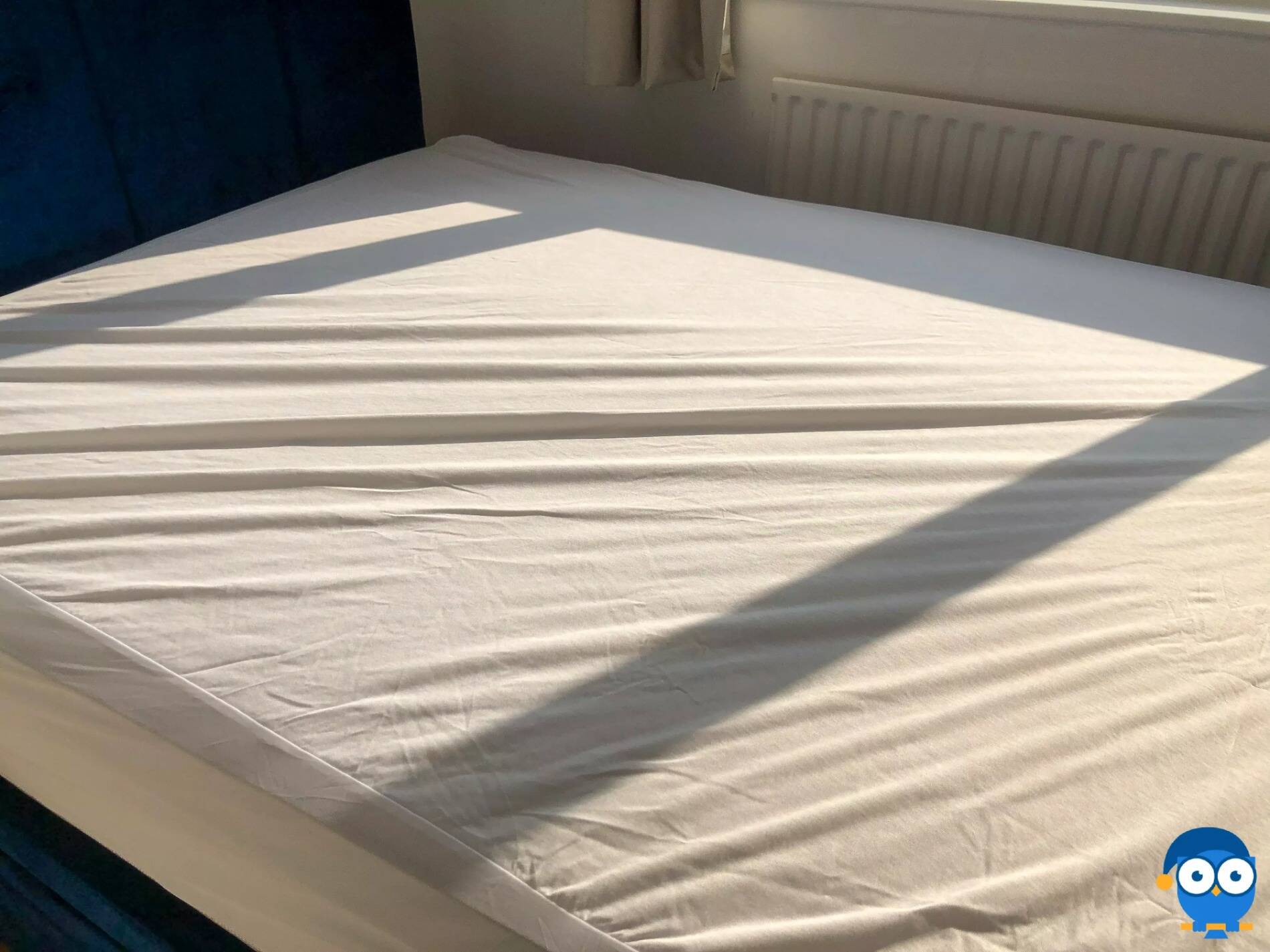 DreamCloud mattress protector on bed